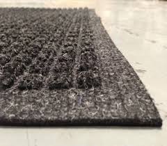 Close up corner view of Charcoal Waterhog Drainable floor matting
