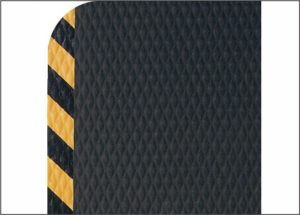 Aerial view of Hog Heaven 5/8 thick anti fatigue mat with striped yellow safety edging