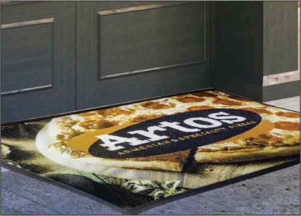 Waterhog Impressions HD custom logo mat with standard rubber edging used as an outside entrance mat to a restaurant