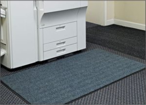 Chevron floormat used in front of a copy machine