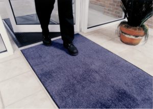 Olefin Entrance mat placed inside the front entrance of a business