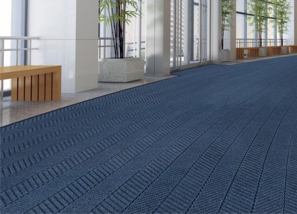 Large door mat application using Waterhog Eco Elite roll goods in the atrium lobby of an office building