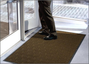 Waterhog Legacy Classic Front Door Mats with Standard Edge used as a Zone 2 indoor floor mat to an office