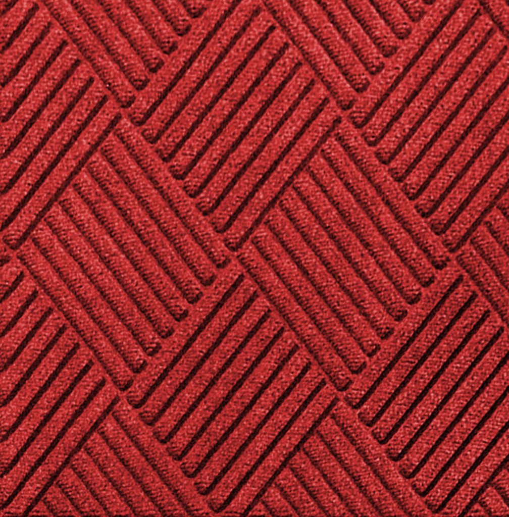 Close up view of Waterhog Classic Diamond floor mats in the color Solid Red