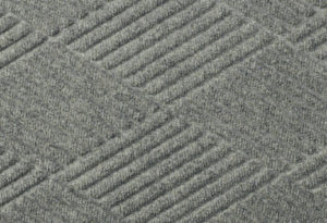 Close up surface view of Waterhog Eco Premier floor matting in a Gray Ash color