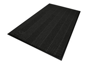 Close up view detailing surface pattern of a Waterhog Eco Elite entrance mat with standard edges in a Black smoke