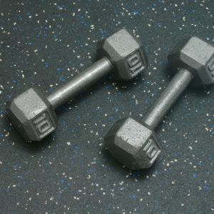 Dumbells resting on Heavy Duty Rolled Rubber Flooring for gyms