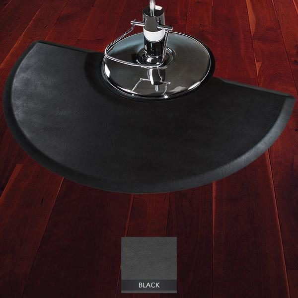 Tough Guy Salon Mat for Stylists with chair on top showing beveled edges half oval shape