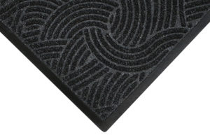 Close up corner view of Waterhog Plus floor mats detailing edge details and surface pattern of the entrance mat