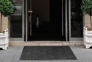 Waterhog Plus Swirl Entrance Mat Floor Mat used as an outdoor mat for an apartment building