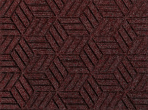 Close up view of a Maroon Waterhog Legacy Eco floor mat detailing the high tech floor surface pattern of the walk off mat