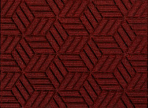 Close up view of a Regal Red Waterhog Legacy Eco entrance mat detailing the high tech floor surface pattern of the walk off mat