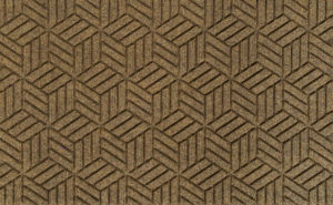 Close up view of a Camel Waterhog Legacy Classic entrance mat detailing the high tech floor surface pattern of the entry mat