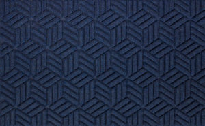 Close up view of a Navy Waterhog Legacy Classic entrance matting detailing the high tech floor surface pattern of the front door mat
