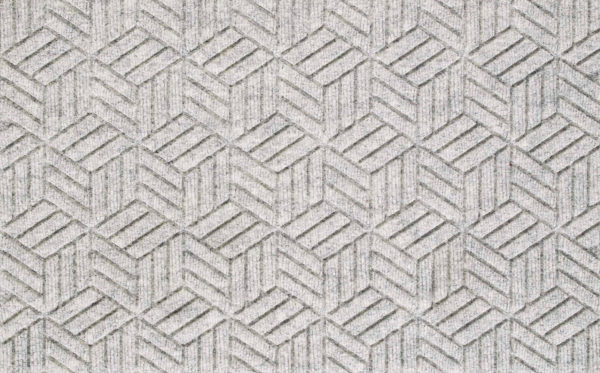 Close up view of a White Waterhog Legacy Classic entrance matting detailing the high tech geo floor surface pattern of the front door mat