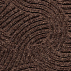 Close up view of Waterhog Plus entrance mat showing the Swirl Pattern in a Chestnut Brown