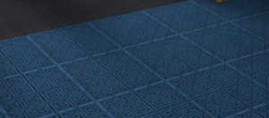 Recessed Entrance Mat using Waterhog Eco Premier Carpet Tiles with Geometric Pattern in an Indigo Blue color