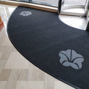 Custom Logo Mat installed around Revolving door -Atlanta, GA